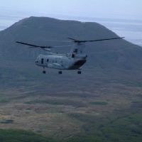 46 flying in front of Mt. Suribachi.