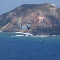 The second pic of the 46 flying by Suribachi.