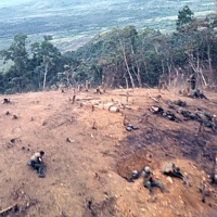 Marine engineers blasting a hill top for an outpost just west of Danang. HMM-263