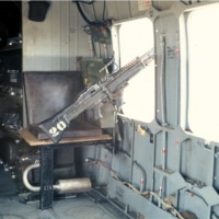 YL-1 with special configuration for medi-vac. Gunner seat over APU. Curtis King