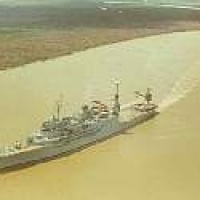 Seaplane tender sailing down Siagon river