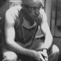 HM2 David L. Newton in thought between surgeries