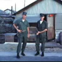 Wiley Lewis (flt. surgeon on the left) and ???