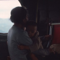 Grandmother with grandchild on CH-46
