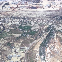 Village between the Marble Mountains