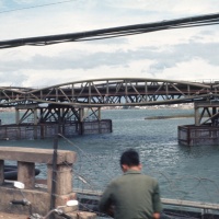 ARVN fishing from bridge