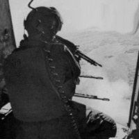 UH-1E Door Gunner at work