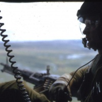 VMO-3; Gunner relaxing enroute...