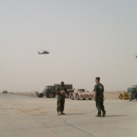 Gunny Gibbs playing basket ball with Tom Goodheart in TQ Iraq.