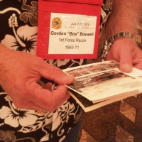 Bos looking at WWII photos