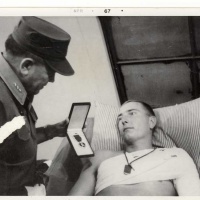 RECEIVING HIS PURPLE HEART