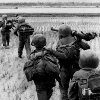 Vietnamese soldiers leave an HMM-365 U.S. Marine Corps helicopter south