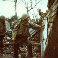 Marines leaning against the wall of the citadel