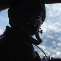 VMO-3 Crew Chief in Flight near Hue Spring 1967.