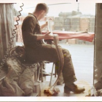 Cpl Howard loading ammo--LZ Stud / early 1969