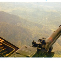 Vmo-6 Gunship Flying High Above the Mountains
