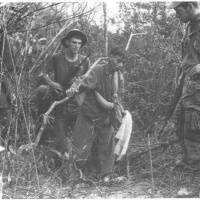 NVA surrenders under WHITE FLAG