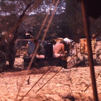 Marines doing business on a 4 Holer at Chu Lai June 1965