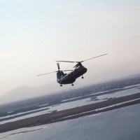 Chase CH-46 flaring to slow