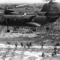 Marines in landing zone after debarking from a CH-46