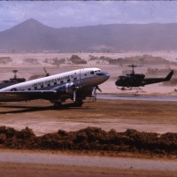 MAG 12 R4D meets Marine HU1E at Chu Lai Sept. 1965