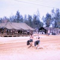 VMA 25 Marines returning from Beach with their Expeditionary Surf Boards (rubber ladies) at Chu Lai