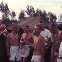 VMA 225 Pilots relax with a beer after mission. Chu Lai Aug. 1965
