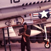 VMA 225 Plane Captain Bob Kasper from Connecticut preflights A4C Aircraft.