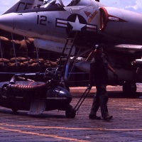 VMA 225 Marine with Starter on Flight Line at Chu Lai Aug. 1965.