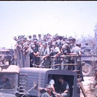 Marines on Trucks leaving USO Show Aug. !965