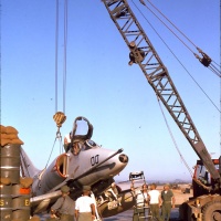 Crane is used to right VMA 311 WL 00 at Chu Lai Sept. 1965.
