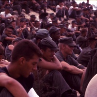 Marines watching USO Show at Chu Lai Aug. 1965.