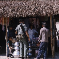 Marine with M 14 shopping in Ville south west of Chu Lai Sept. 1965.