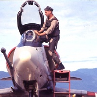 Pilot Ralph Stewart climbs into Cockpit of A4C Aircraft from VMA 225 at Chu Lai Sept. 1965