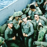 VMA 225 Marines in LCVP ( Peter ) Boat in Iwakuni Harbor on their way to Chu Lai.
