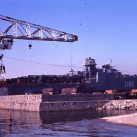 LST 1166 Washtenaw County being loaded up in Iwakuni Harbor for trip to Chu Lai May 17