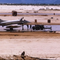 VMA 225 Charlie Echo # 19 being hauled by mule on taxiway at Chu Lai Aug. 1965