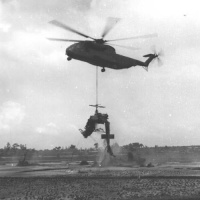 HMH-463 CH-53 Lifting Crashed MAG-16 Huey
