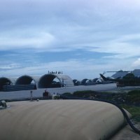 HML-367 Marines watch gunships taxi for takeoff