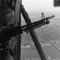 HMM-161 Crewchief and door gun over Hue Citadel