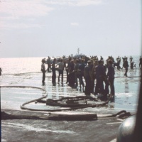 Aftermath USS Thomaston in backgrouind